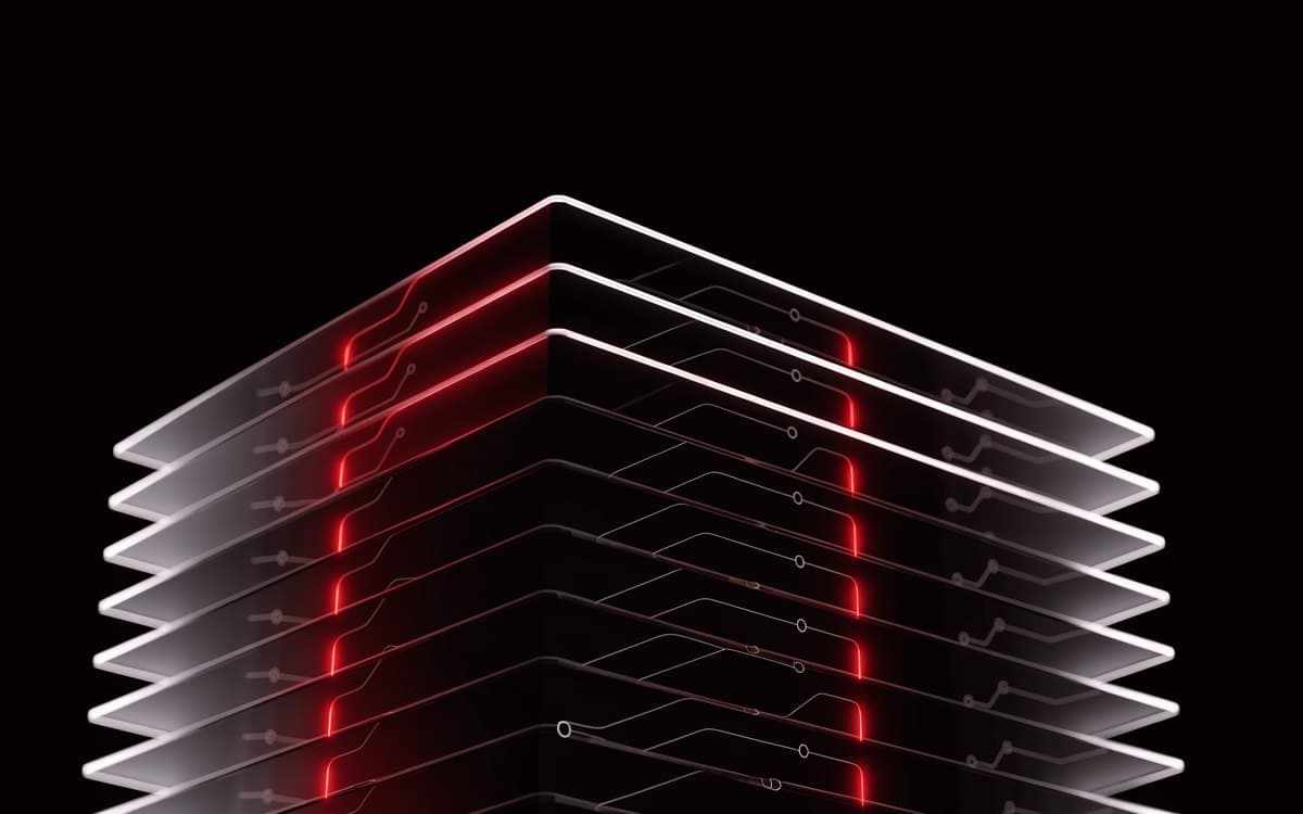 A stack of thin glass plates etched with faint process diagrams, aligning into one block with crimson channels running straight through it.